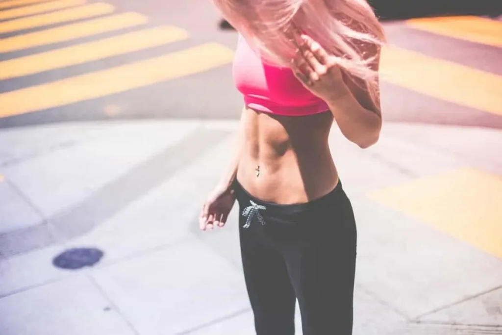 Woman with toned stomach after LA-EMS Body Sculpting Treatment Windsor